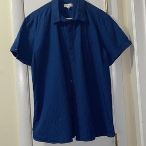 2 SHORT SLEEVE men’s casual dress shirts. One mens small one mens large.